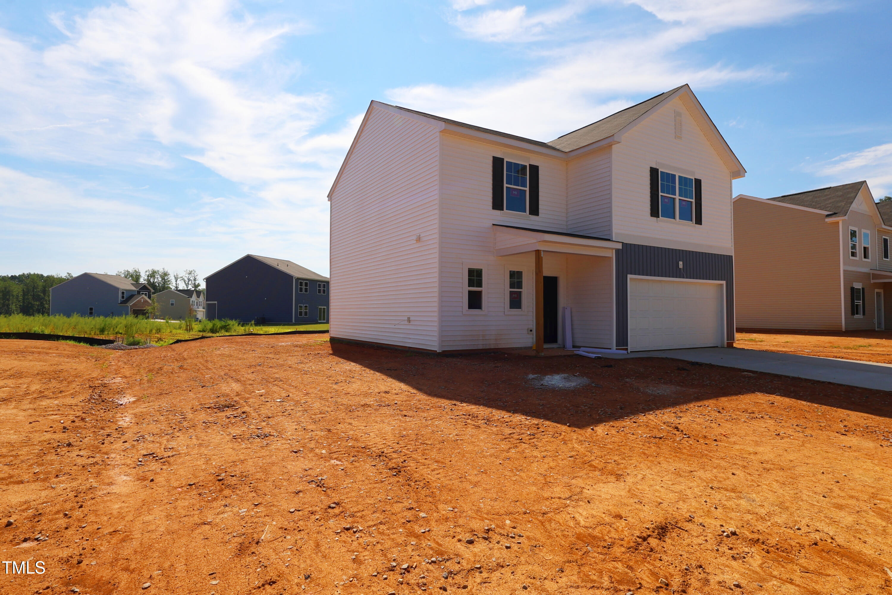 941 Dassault Ln Spring Spring Hope, NC 27882 - Photo 5 of 18 a view of an house with backyard and a pond