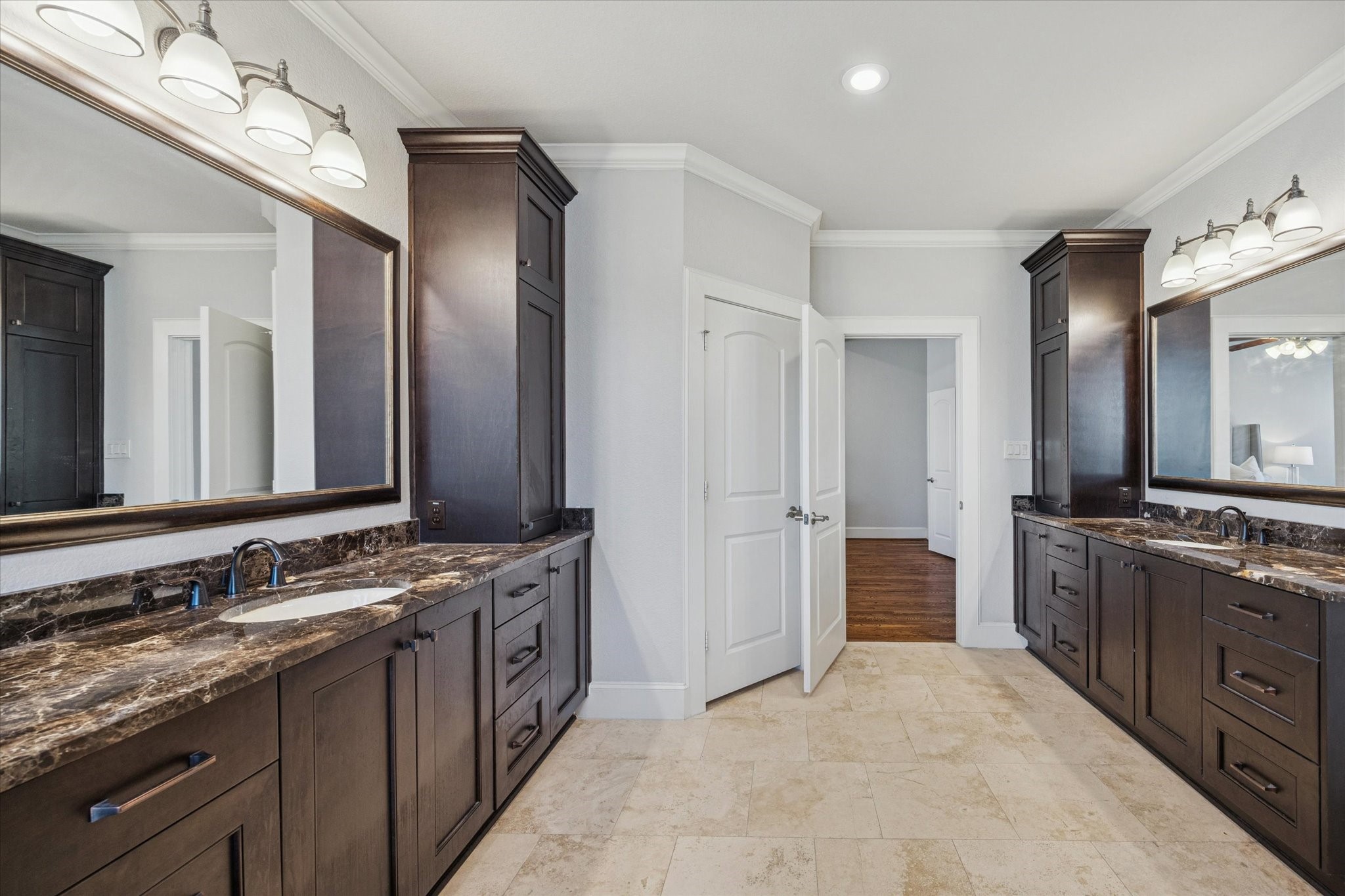 1802 Wakefield Drive Houston, TX 77018 - Photo 28 of 47 Dual-sink bathroom with ample cabinetry and counter space, ideal for a shared or private retreat.
