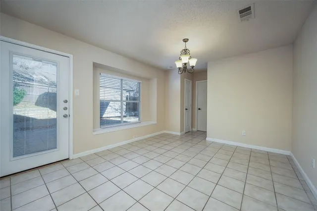 a view of an empty room with window