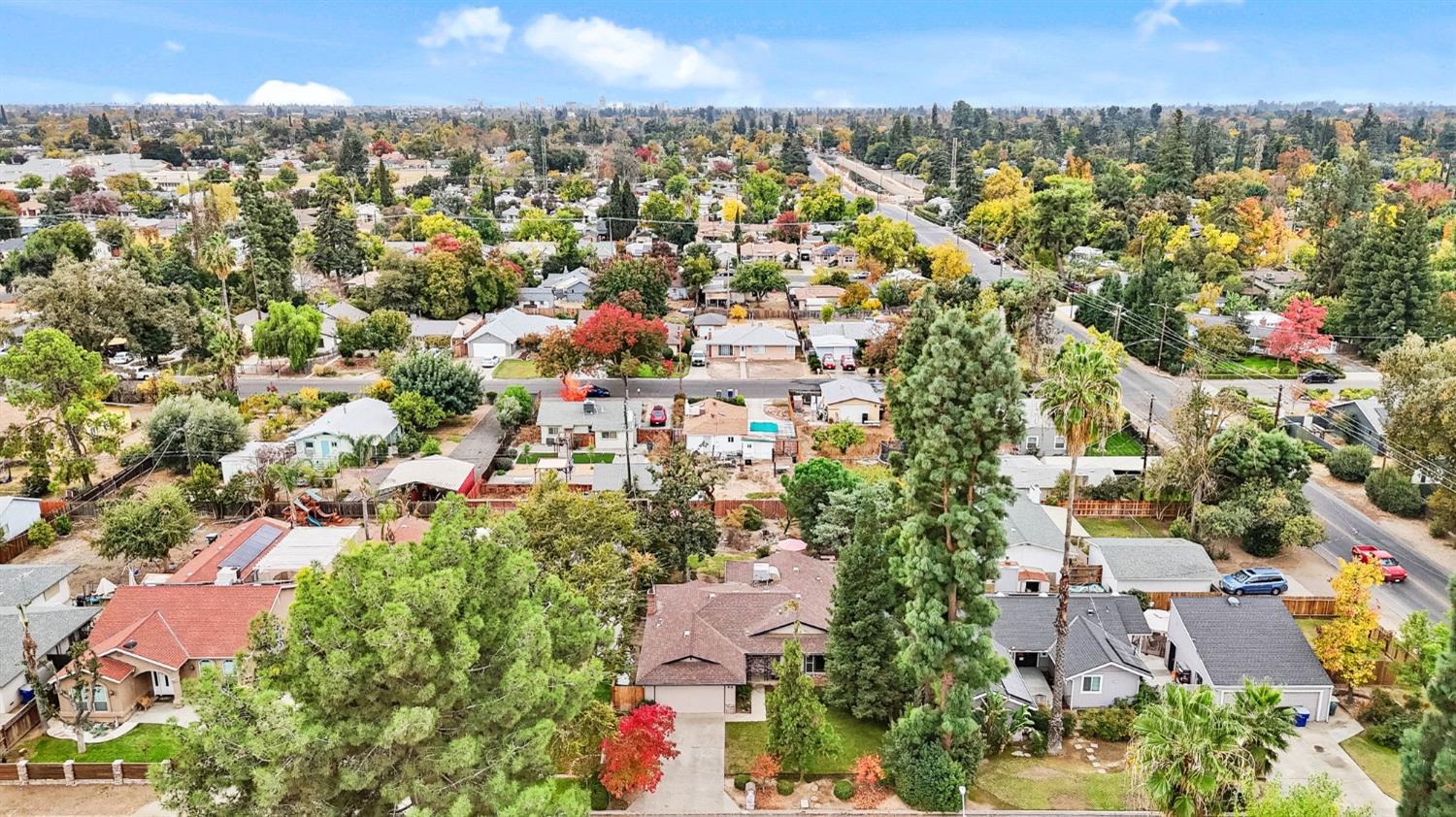 918 East Griffith Way Fresno, CA 93704 - Photo 21 of 21 an aerial view of residential houses with outdoor space and trees