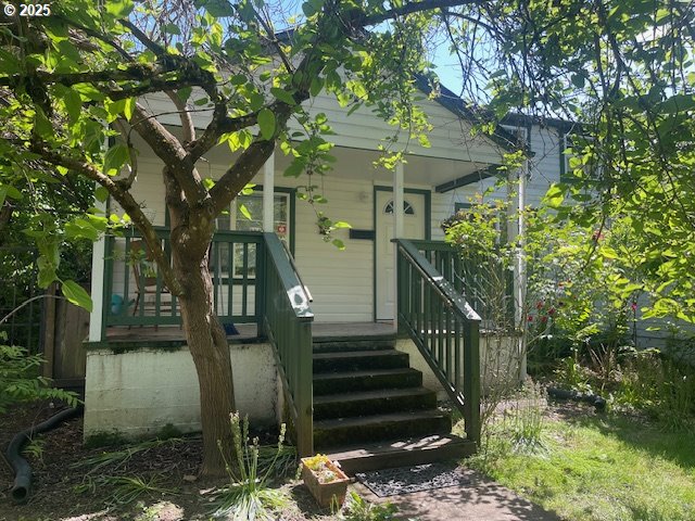 239 D Street Springfield, OR 97477 - Photo 1 of 14 a view of a house with a yard