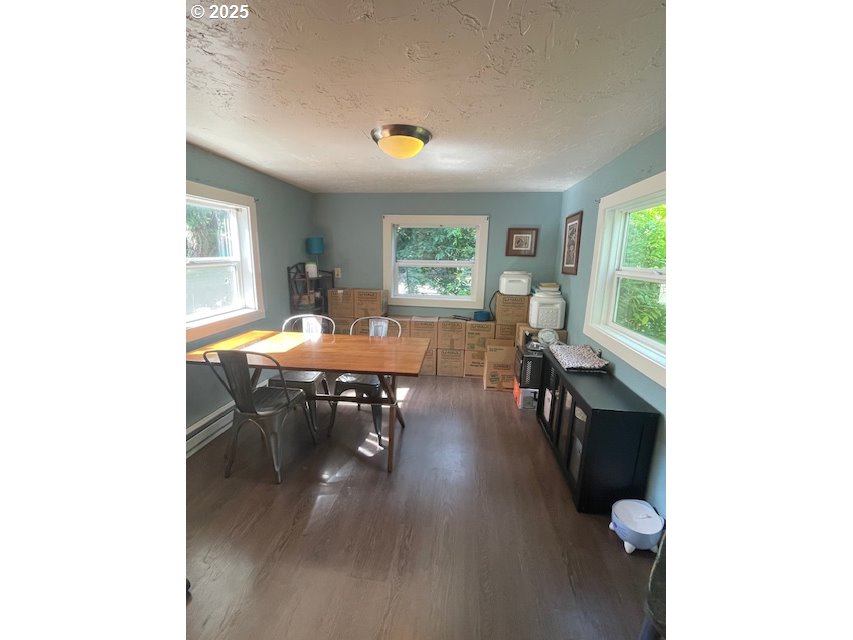 239 D Street Springfield, OR 97477 - Photo 5 of 14 a living room with furniture and a large window