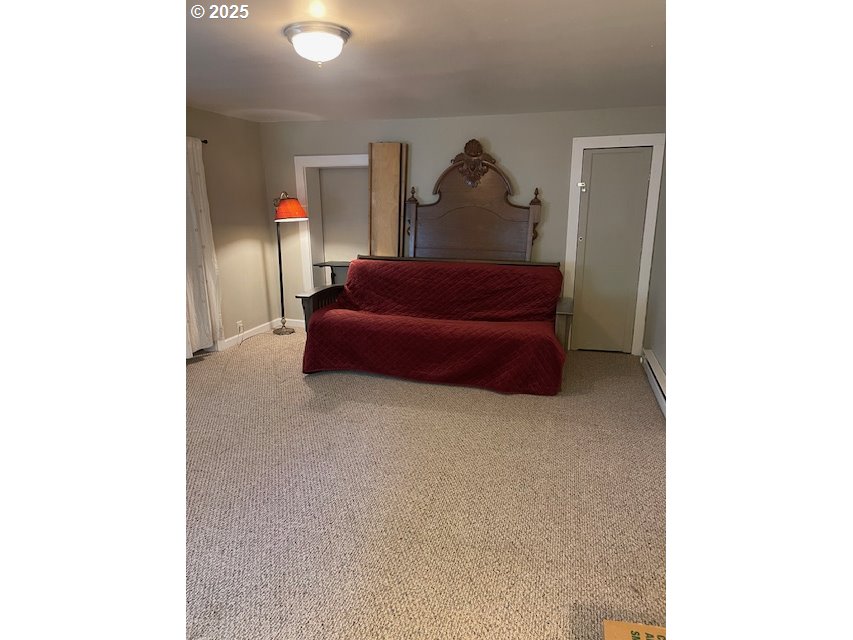 239 D Street Springfield, OR 97477 - Photo 6 of 14 a living room with furniture and a wooden floor