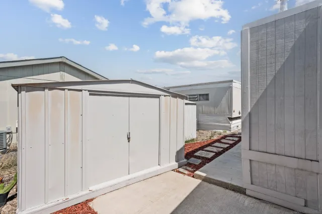 a view of a hallway with staircase