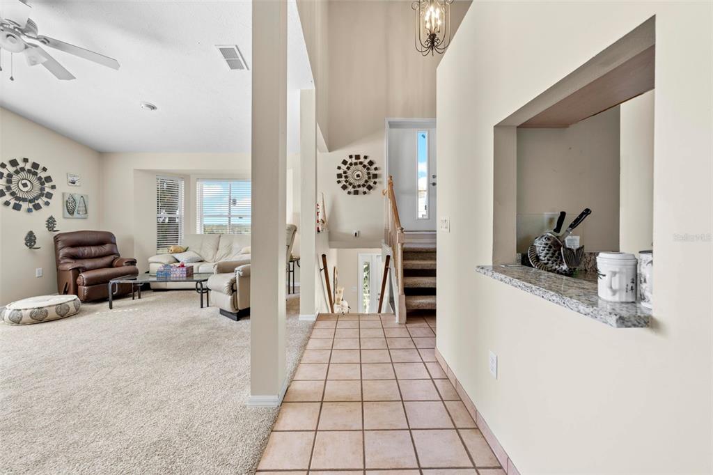 Undisclosed Address Hernando Beach, FL 34607 - Photo 47 of 90 a view of a bedroom with furniture and large window