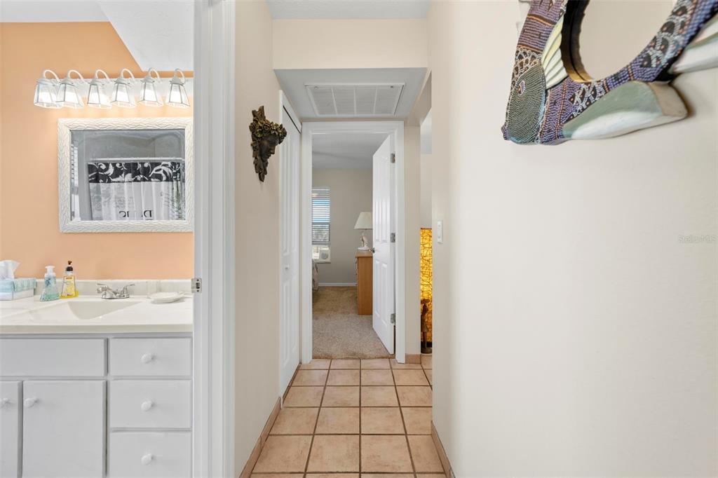 Undisclosed Address Hernando Beach, FL 34607 - Photo 54 of 90 a bathroom with a sink and a mirror