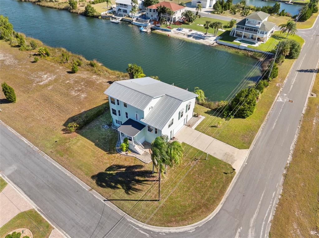 Undisclosed Address Hernando Beach, FL 34607 - Photo 61 of 90 a view of a lake from a balcony