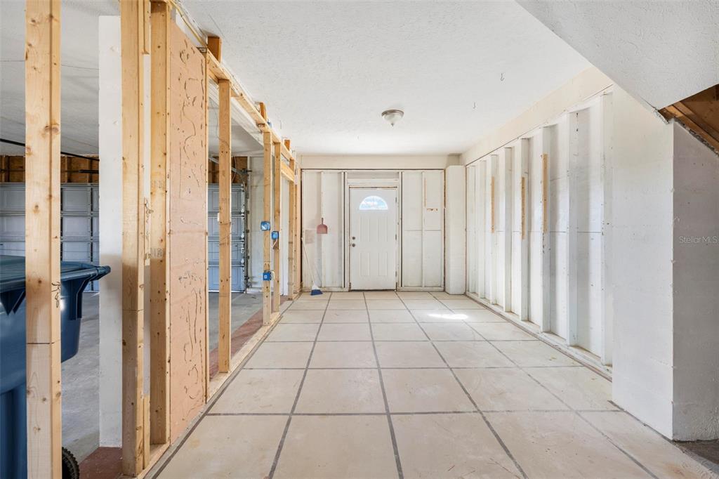 Undisclosed Address Hernando Beach, FL 34607 - Photo 73 of 90 a view of a entryway with interior of a house