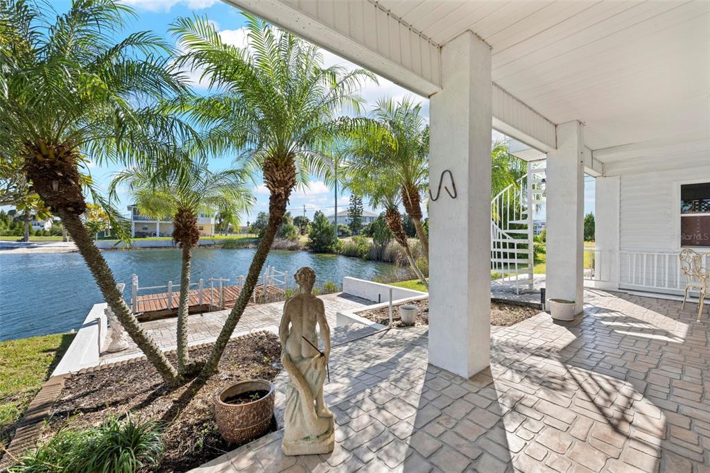 Undisclosed Address Hernando Beach, FL 34607 - Photo 86 of 90 a view of a house with backyard from a tub