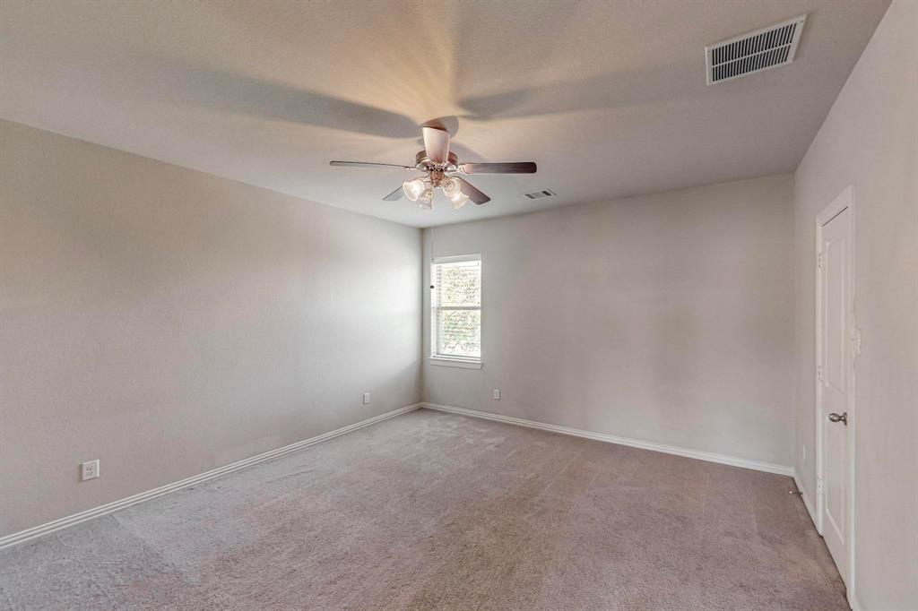 6723 Capistrano Street Irving, TX 75039 - Photo 22 of 40 a view of an empty room with a window
