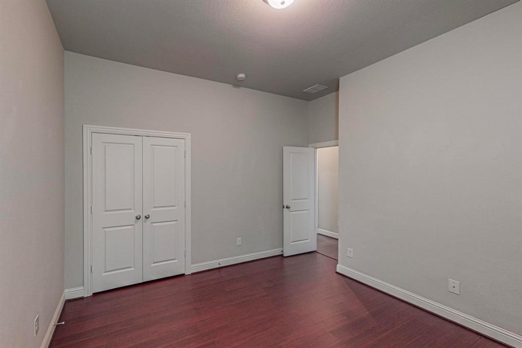 6723 Capistrano Street Irving, TX 75039 - Photo 23 of 40 wooden floor in an empty room