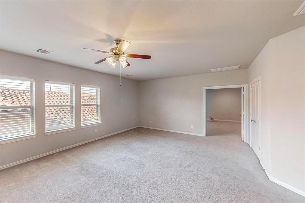 6723 Capistrano Street Irving, TX 75039 - Photo 29 of 40 a view of an empty room with a window