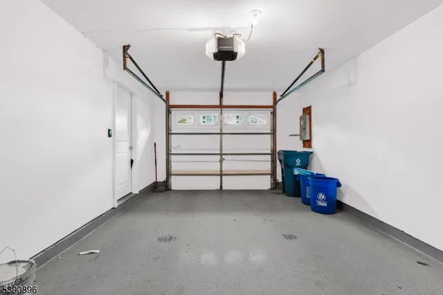 a view of room that has a bed