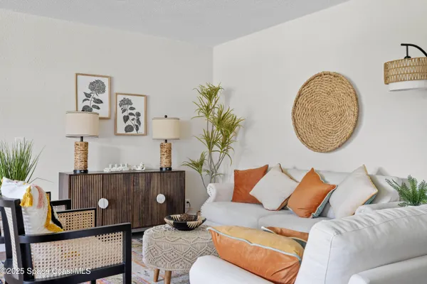 a living room with furniture and a couch