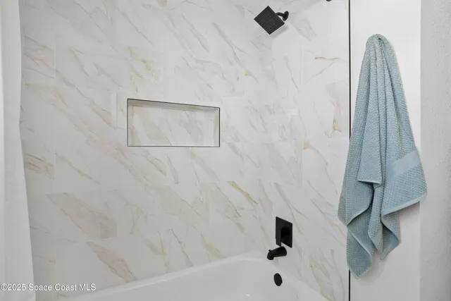 a bathroom with a bathtub