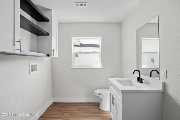 a bathroom with a sink and a toilet