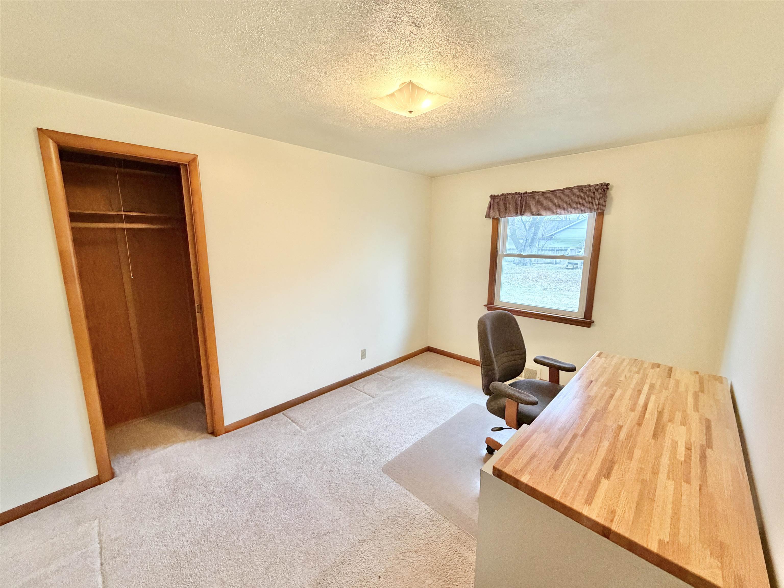 305 West Pershing Street Stillman Valley, IL 61084 - Photo 16 of 37 a view of a room with gym equipment