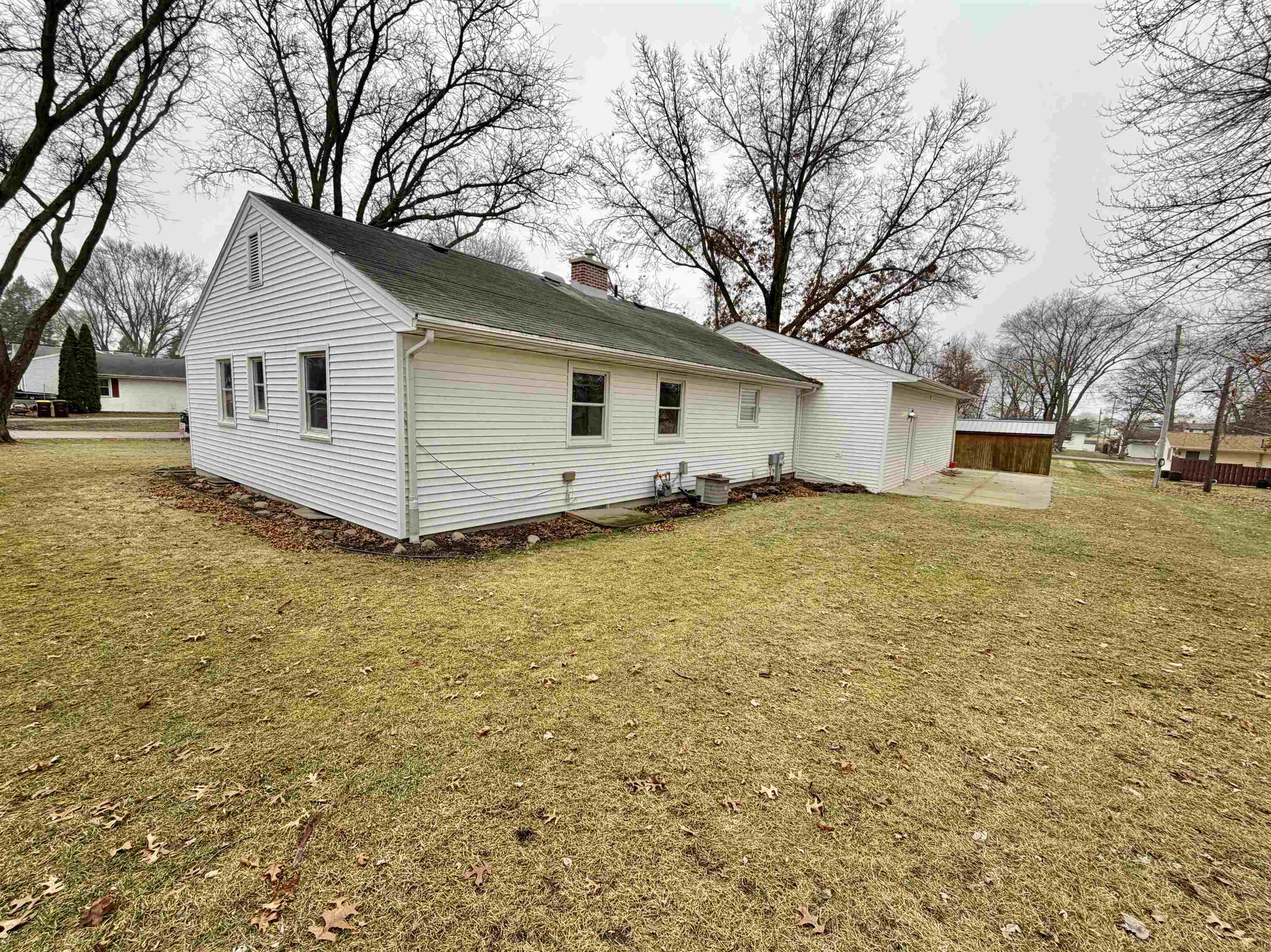 305 West Pershing Street Stillman Valley, IL 61084 - Photo 33 of 37 a view of a house with a yard covered with snow