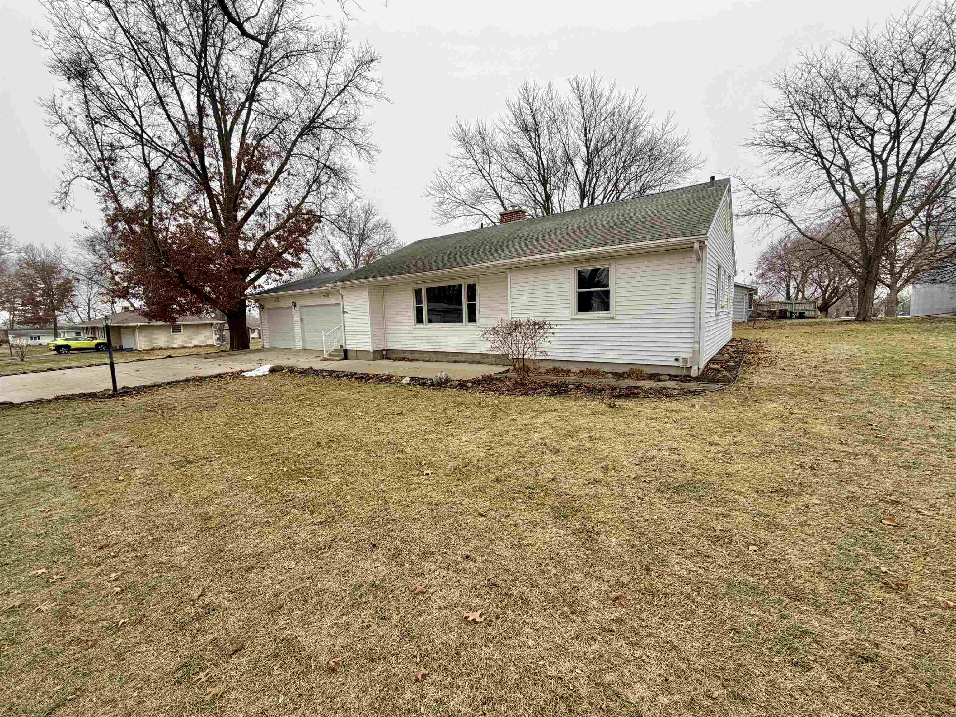 305 West Pershing Street Stillman Valley, IL 61084 - Photo 35 of 37 a view of an house with backyard space and garden
