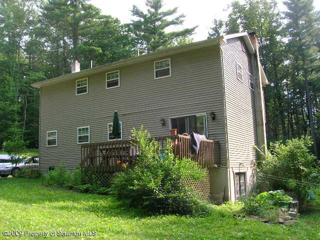 284 Long Mountain Road Effort, PA 18330 - Photo 2 of 20 a view of a house with a yard and plants