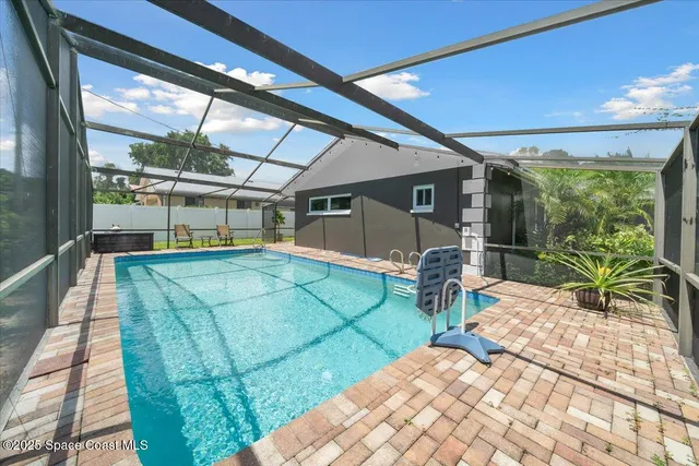 a backyard of a house with seating space