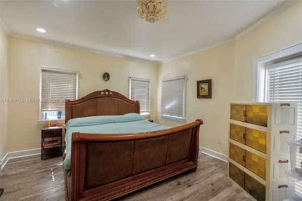 a bedroom with a bed and a closet