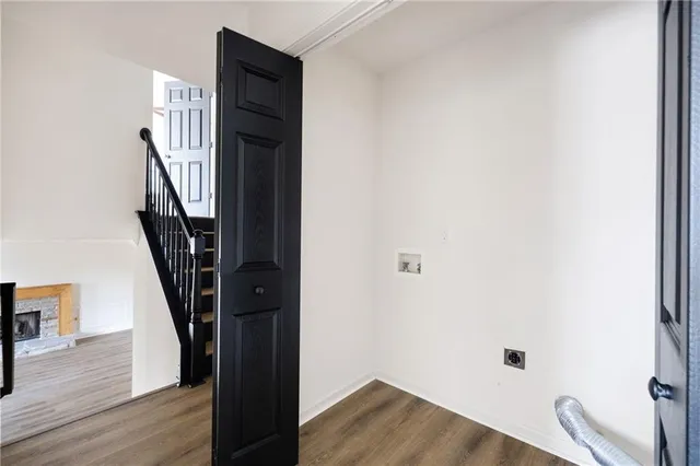 a view of entryway with wooden floor
