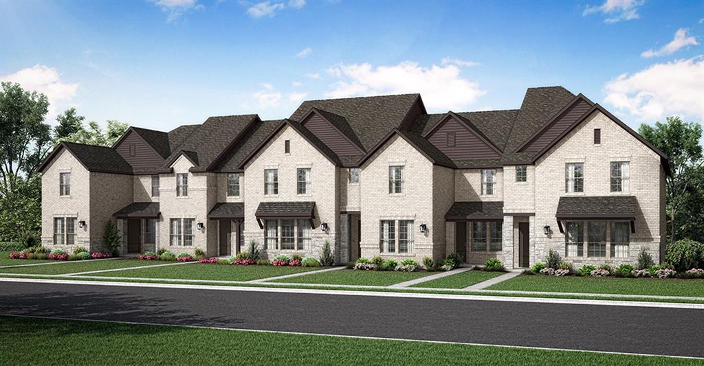 a view of a big house with a big yard and large trees