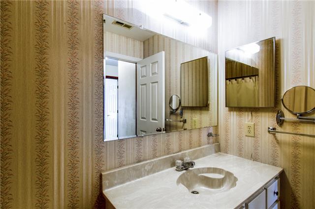 5960 Natchez Trace Road Franklin, TN 37064 - Photo 16 of 18 a bathroom with a sink and a mirror