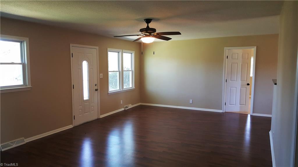 8131 East Harrell Road Oak Ridge, NC 27310 - Photo 2 of 13 Bright and open great room w/ beautiful flooring!