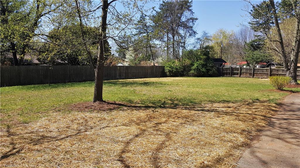 8131 East Harrell Road Oak Ridge, NC 27310 - Photo 13 of 13 Beautiful, level, & partially fenced back yard!!