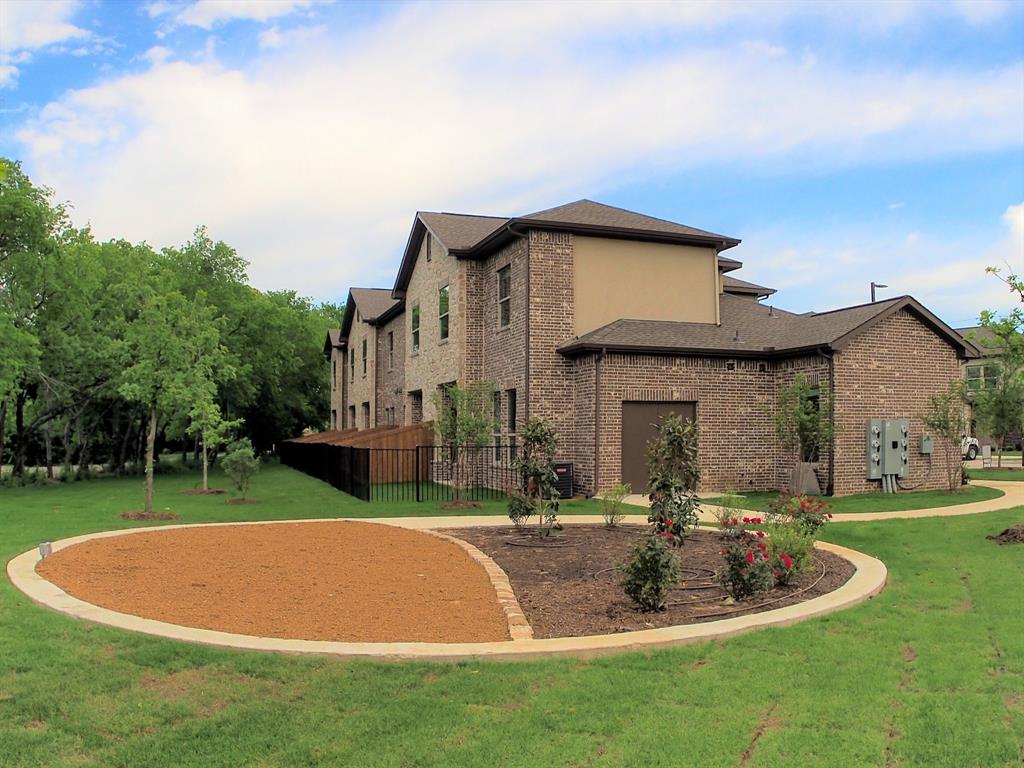 a view of a house with a swimming pool and yard