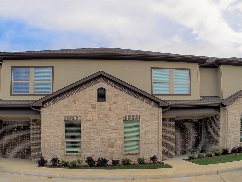1601 Riney Road Denton, TX 76207 - Photo 3 of 18 a front view of a house with garage
