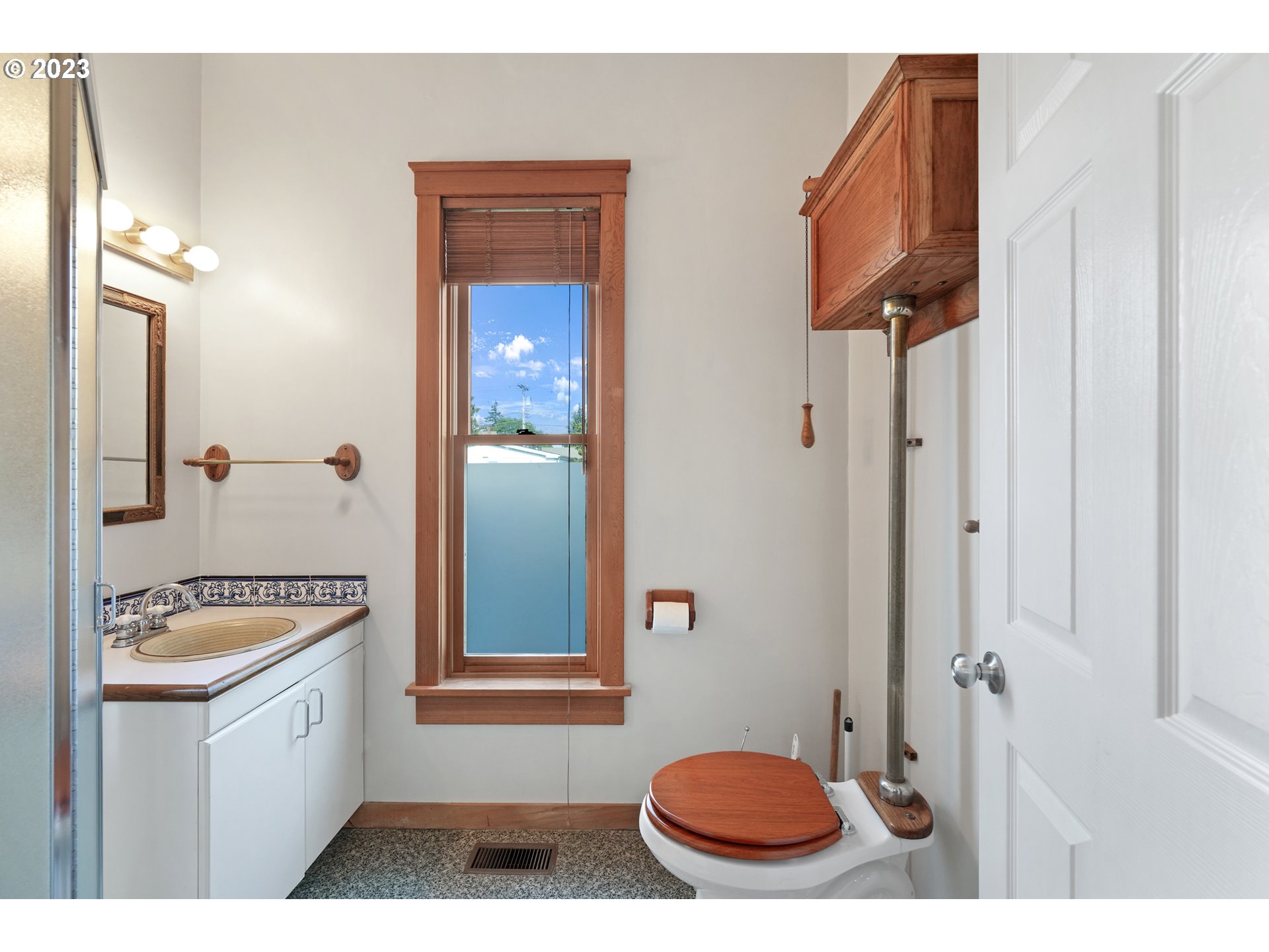 313 Centre Street La Conner, WA 98257 - Photo 12 of 29 a bathroom with a sink and a mirror