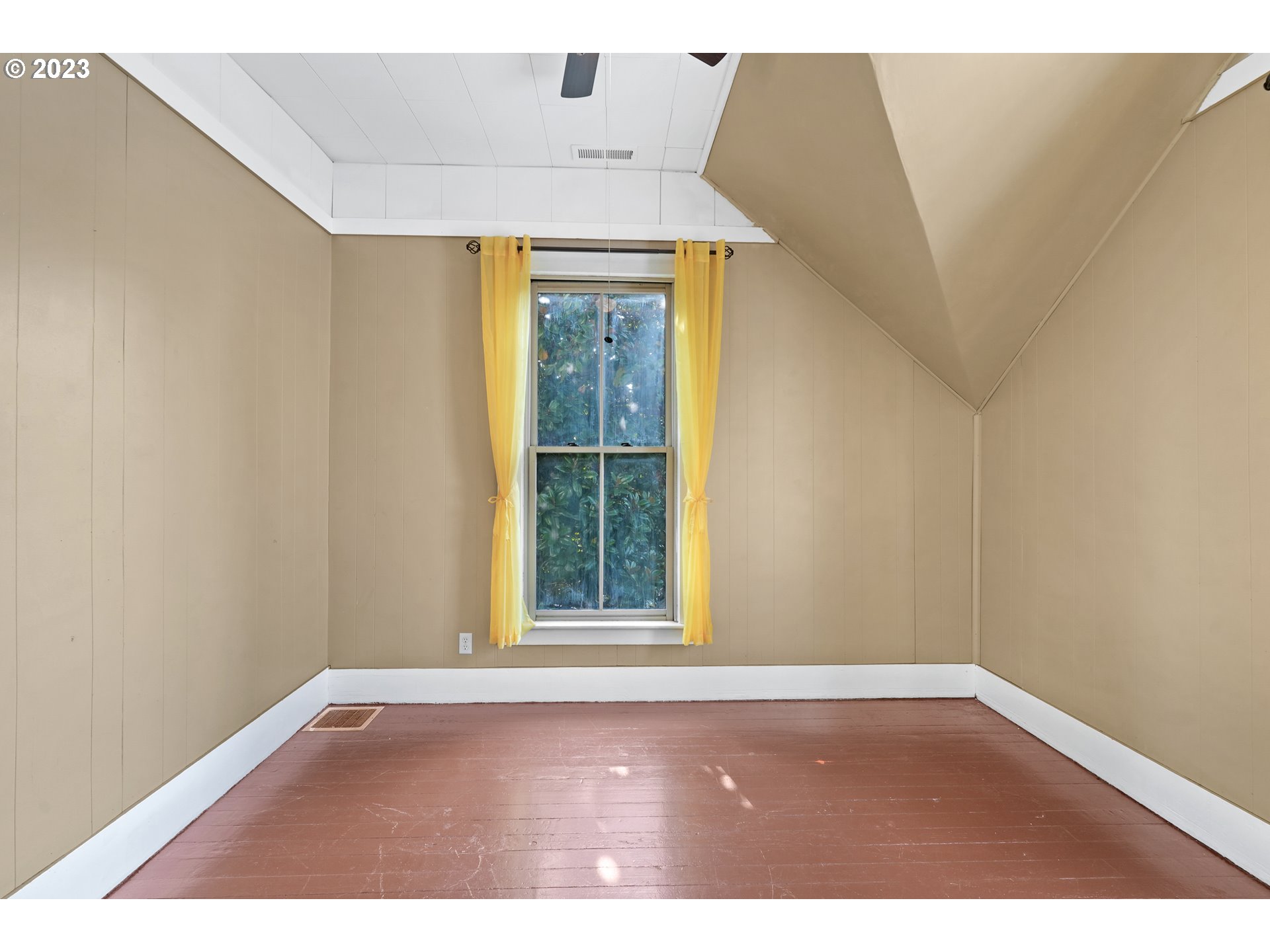 313 Centre Street La Conner, WA 98257 - Photo 18 of 29 a view of an empty room with a window