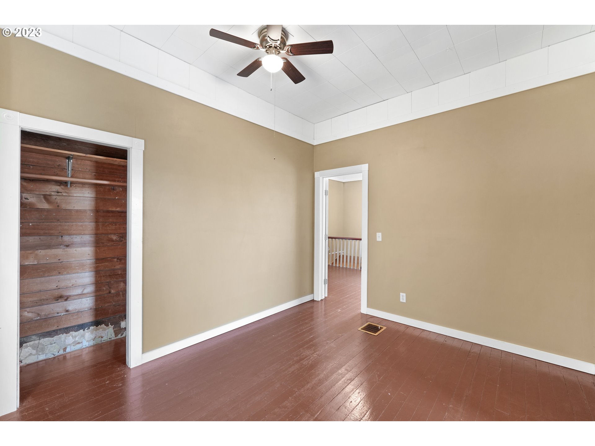 313 Centre Street La Conner, WA 98257 - Photo 23 of 29 a view of empty room with wooden floor