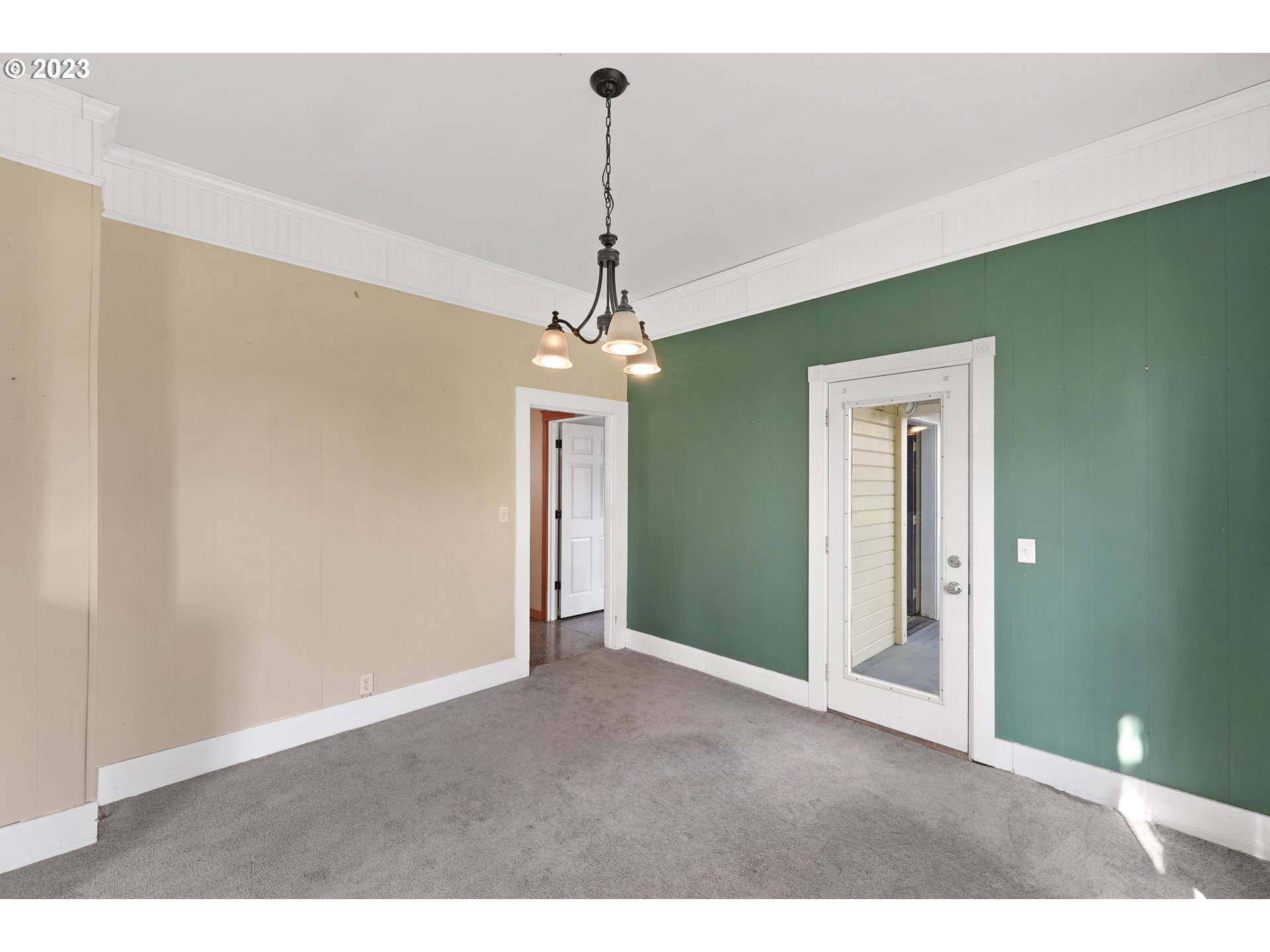 313 Centre Street La Conner, WA 98257 - Photo 8 of 29 a view interior of a house a chandelier fan and wooden floor