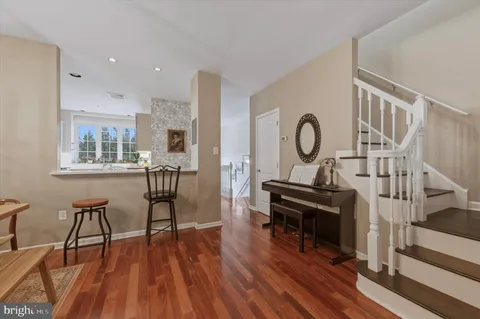 a view of a livingroom with furniture and wooden floor