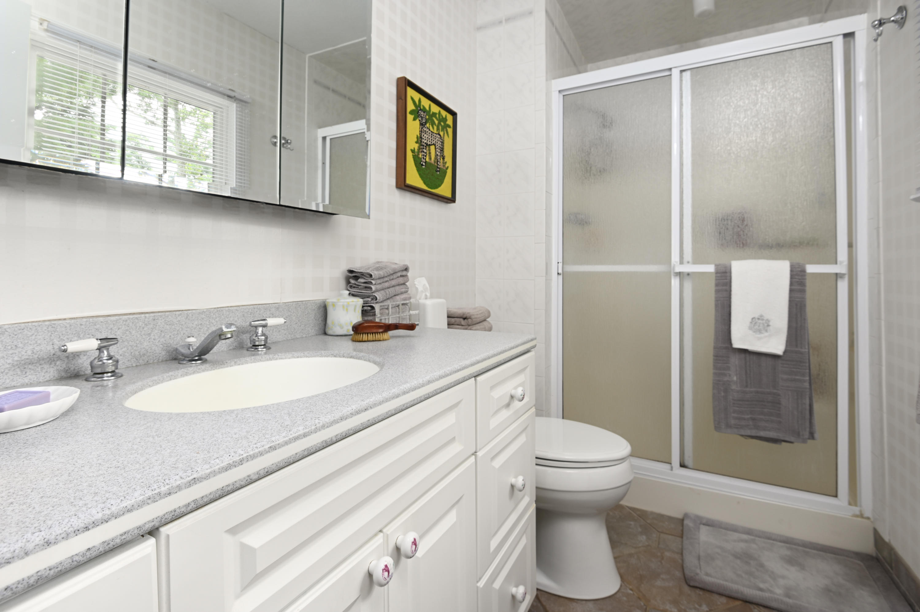 95 Wianno Circle Osterville, MA 02655 - Photo 14 of 32 a bathroom with a sink a toilet and shower