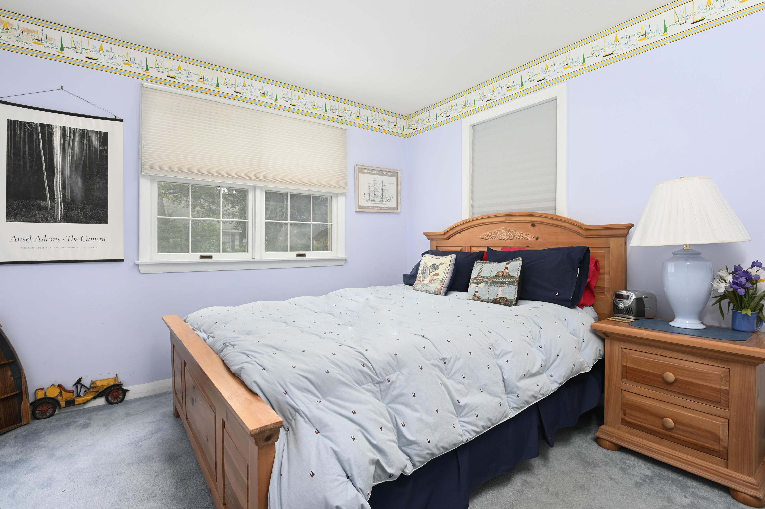 95 Wianno Circle Osterville, MA 02655 - Photo 16 of 32 a bedroom with a bed and a window