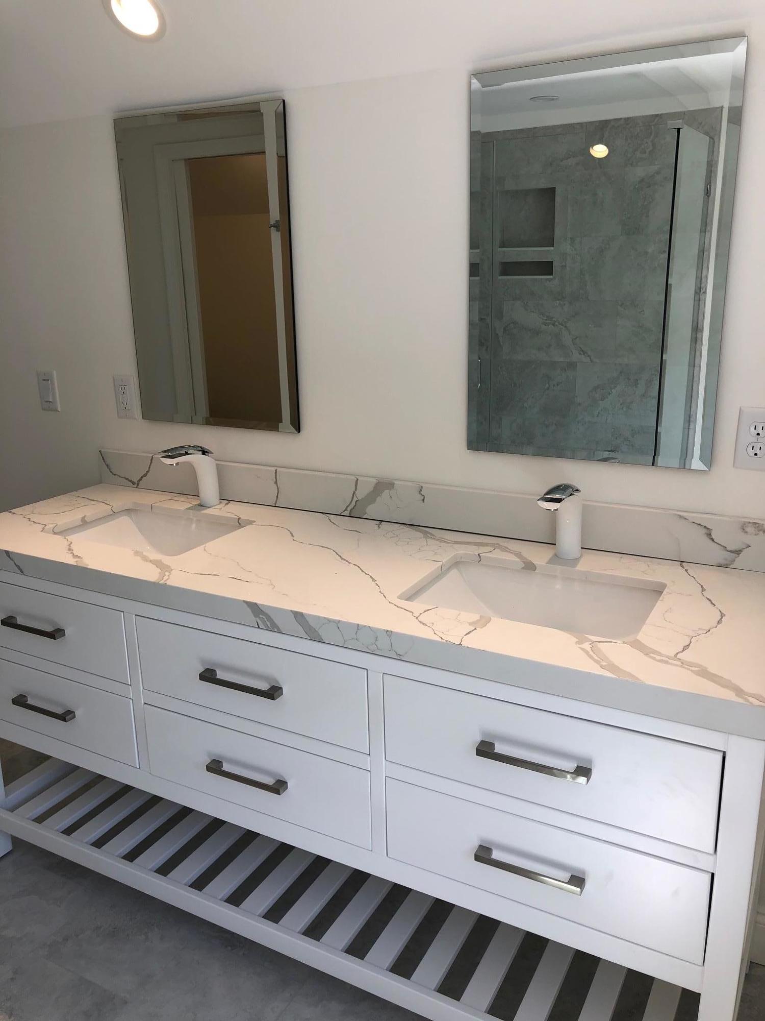 95 Wianno Circle Osterville, MA 02655 - Photo 20 of 32 a bathroom with a sink and a mirror