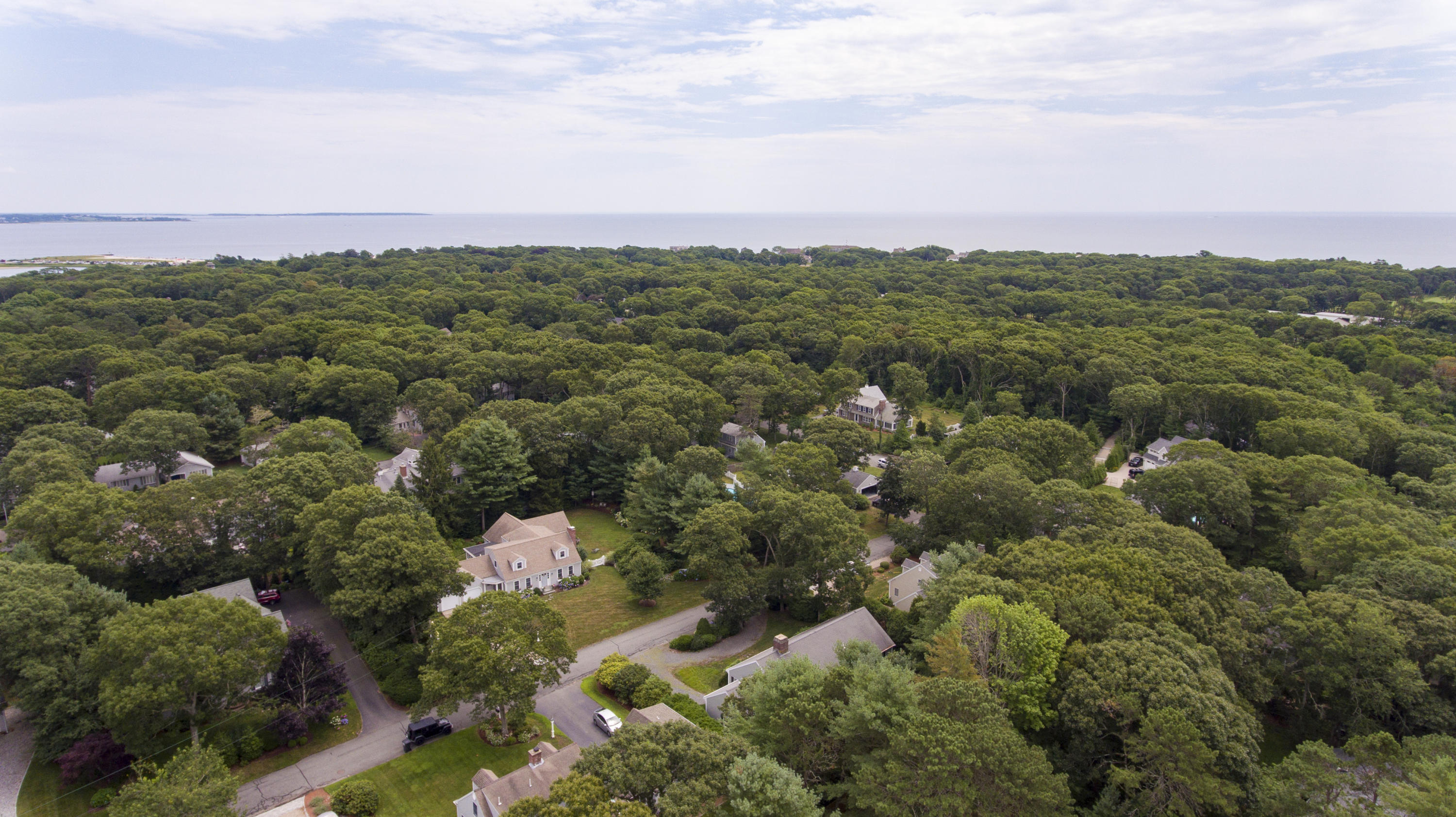 95 Wianno Circle Osterville, MA 02655 - Photo 29 of 32 an aerial view of a city and mountain view in back