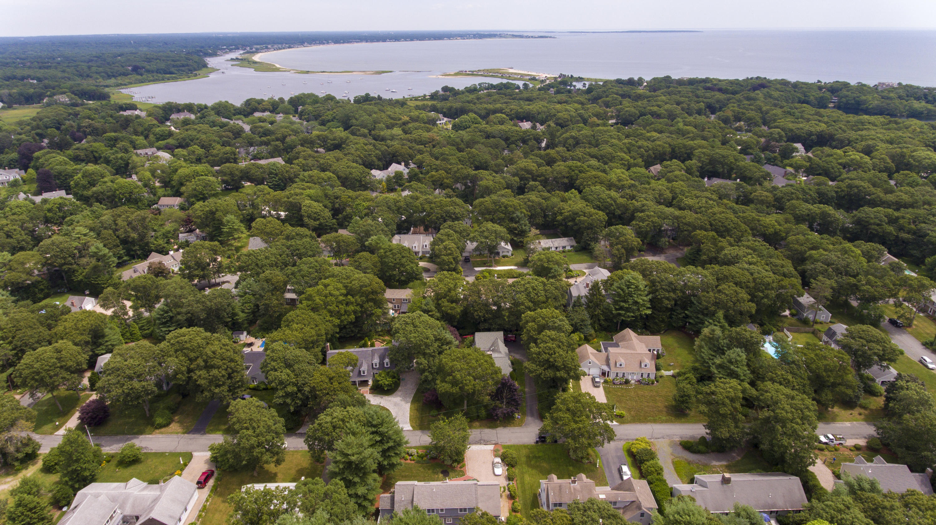 95 Wianno Circle Osterville, MA 02655 - Photo 30 of 32 an aerial view of a city with lots of residential buildings