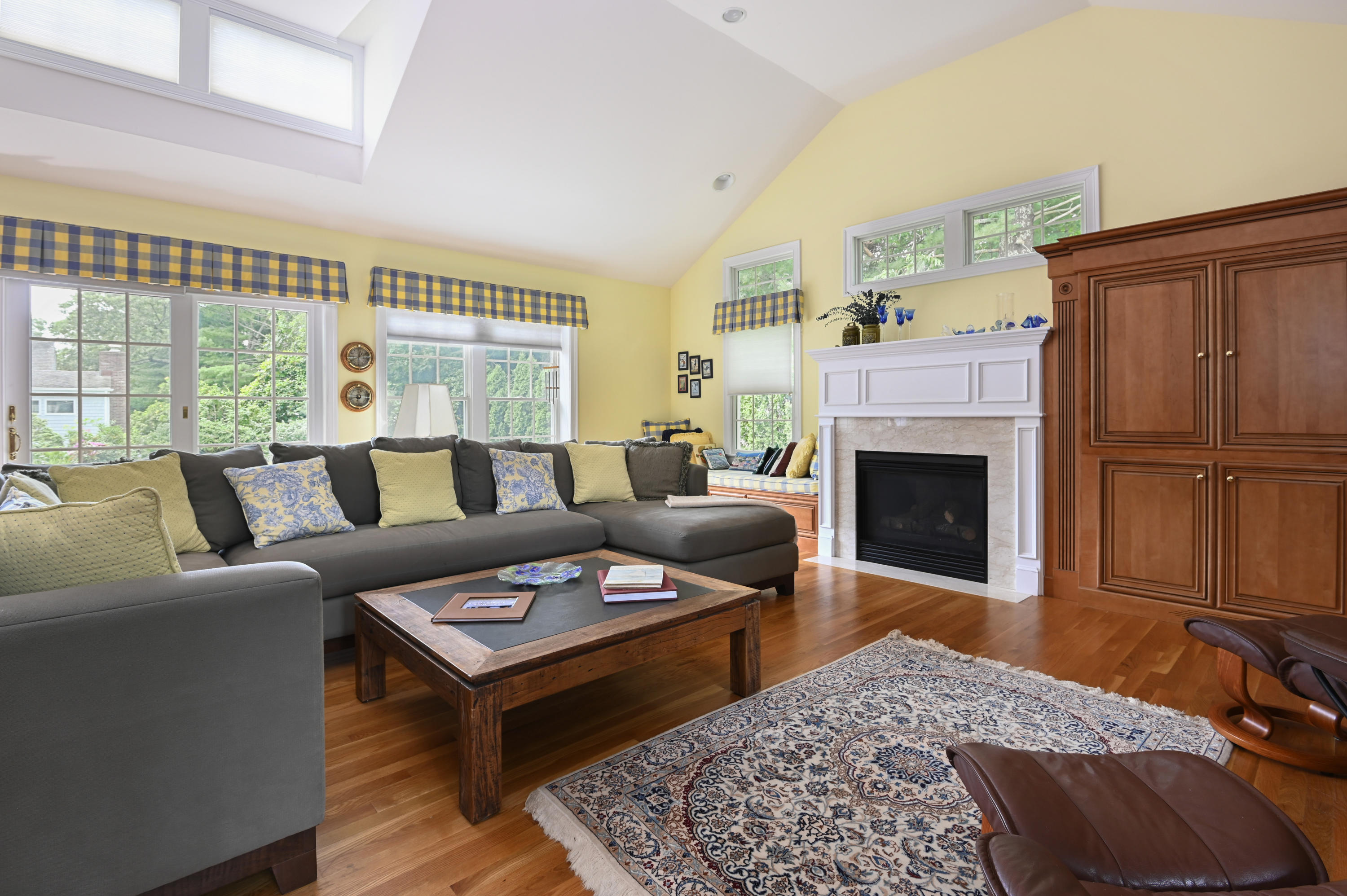 95 Wianno Circle Osterville, MA 02655 - Photo 4 of 32 a living room with furniture and a fireplace