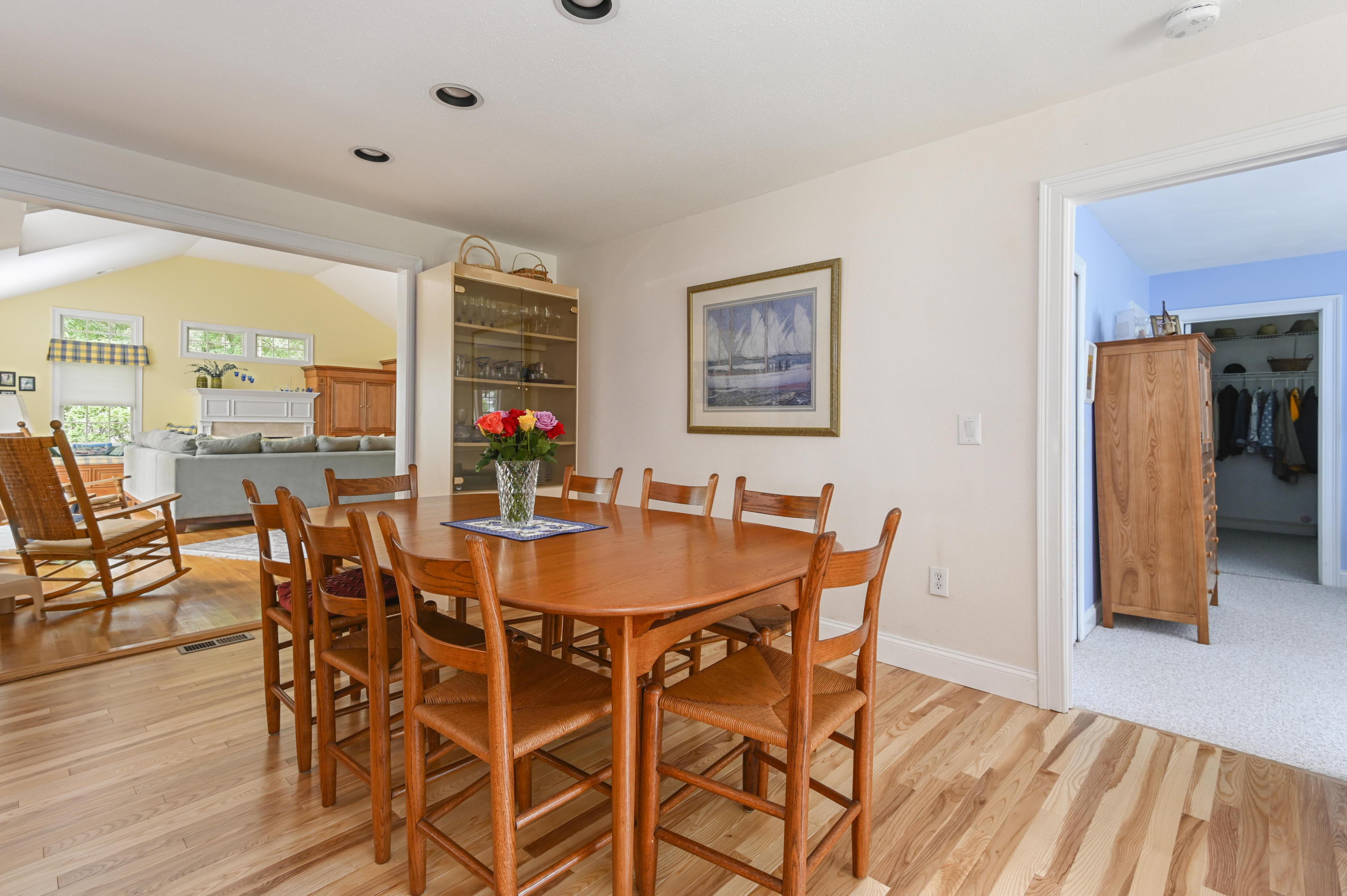 95 Wianno Circle Osterville, MA 02655 - Photo 9 of 32 a view of a dining room with furniture and wooden floor