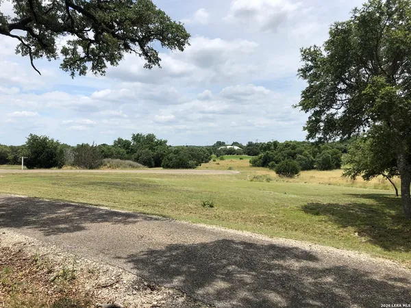 a view of a lake from a yard