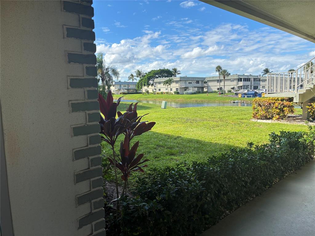 a view of a houses with a yard