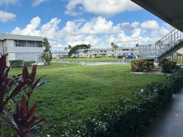 a view of a house with a big yard