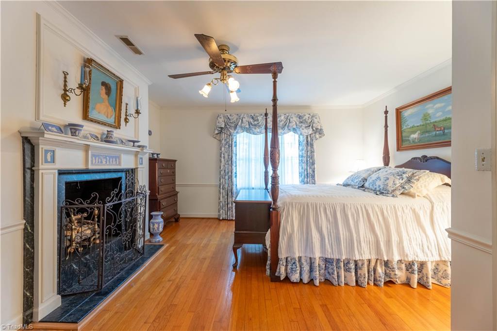 559 Welcome-Arcadia Road Lexington, NC 27295 - Photo 24 of 37 Wedgewood bedroom with a custome fireplace surround