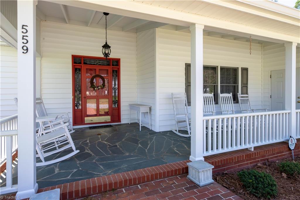 559 Welcome-Arcadia Road Lexington, NC 27295 - Photo 3 of 37 Beautiful front porch with slate floor.